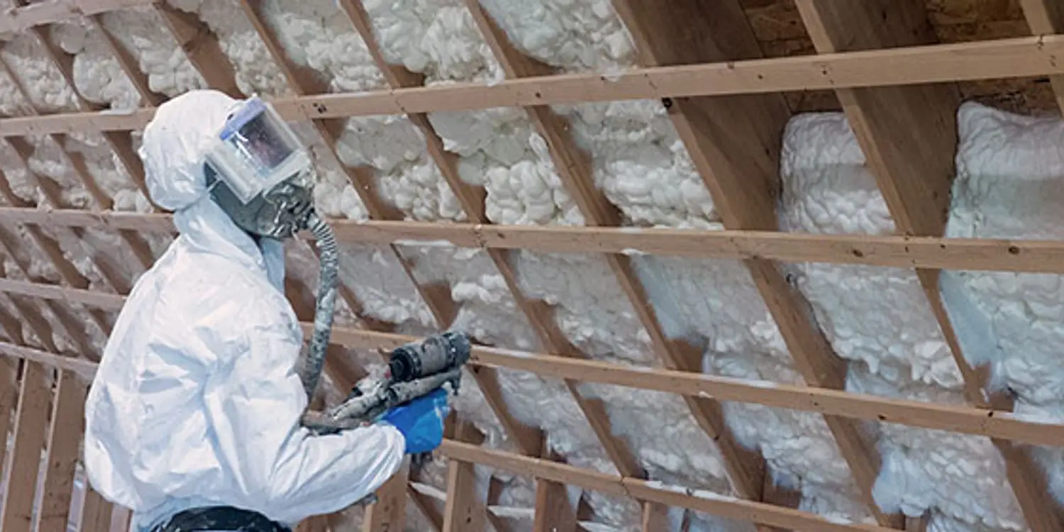 Metal building insulated with spray foam insulation
